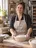 A bakery owner at her bench.